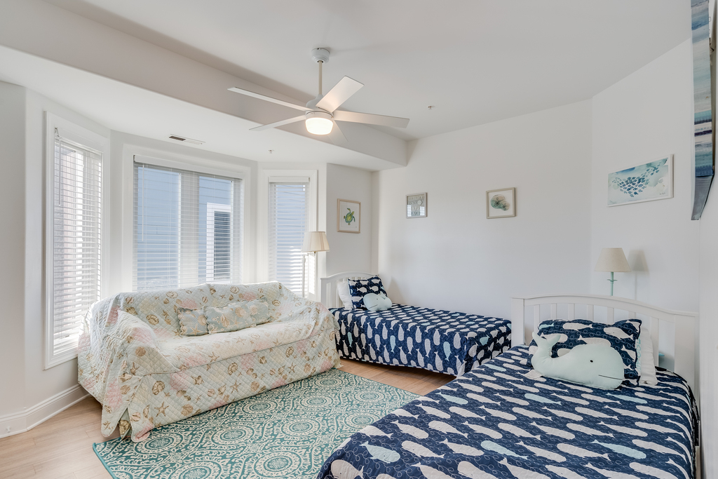 Bedroom 2 has 2 Twins & and adorable Whale Theme.