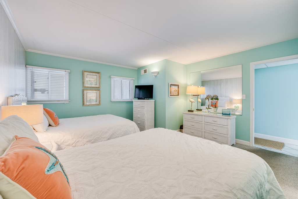 Sink into Bed and catch your favorite shows on the Flat Screen TV.