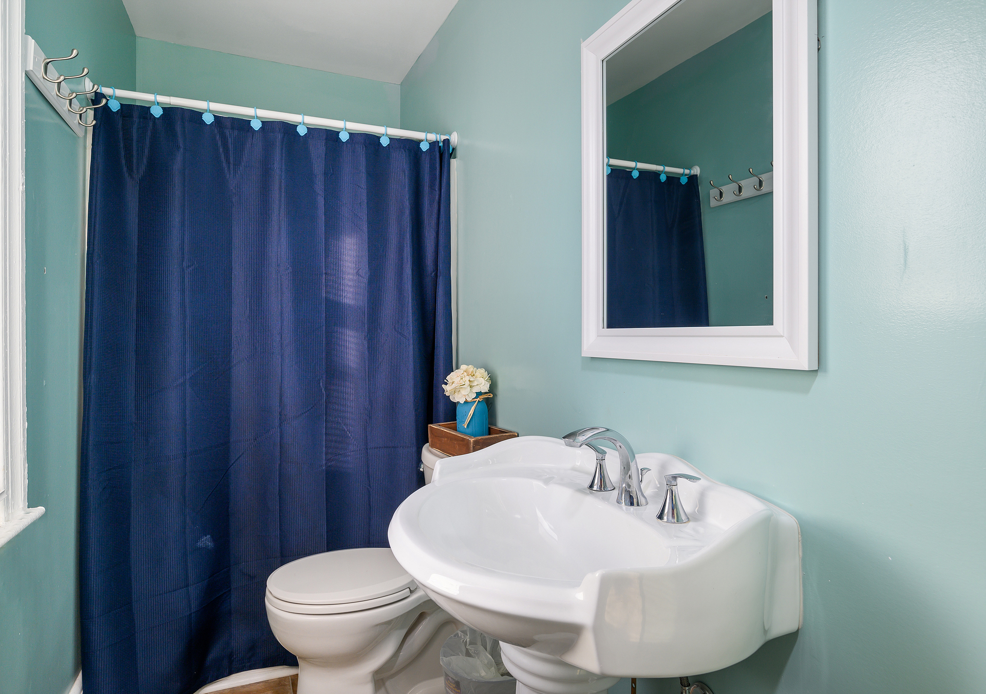 Another full bathroom gives space and privacy for everyone