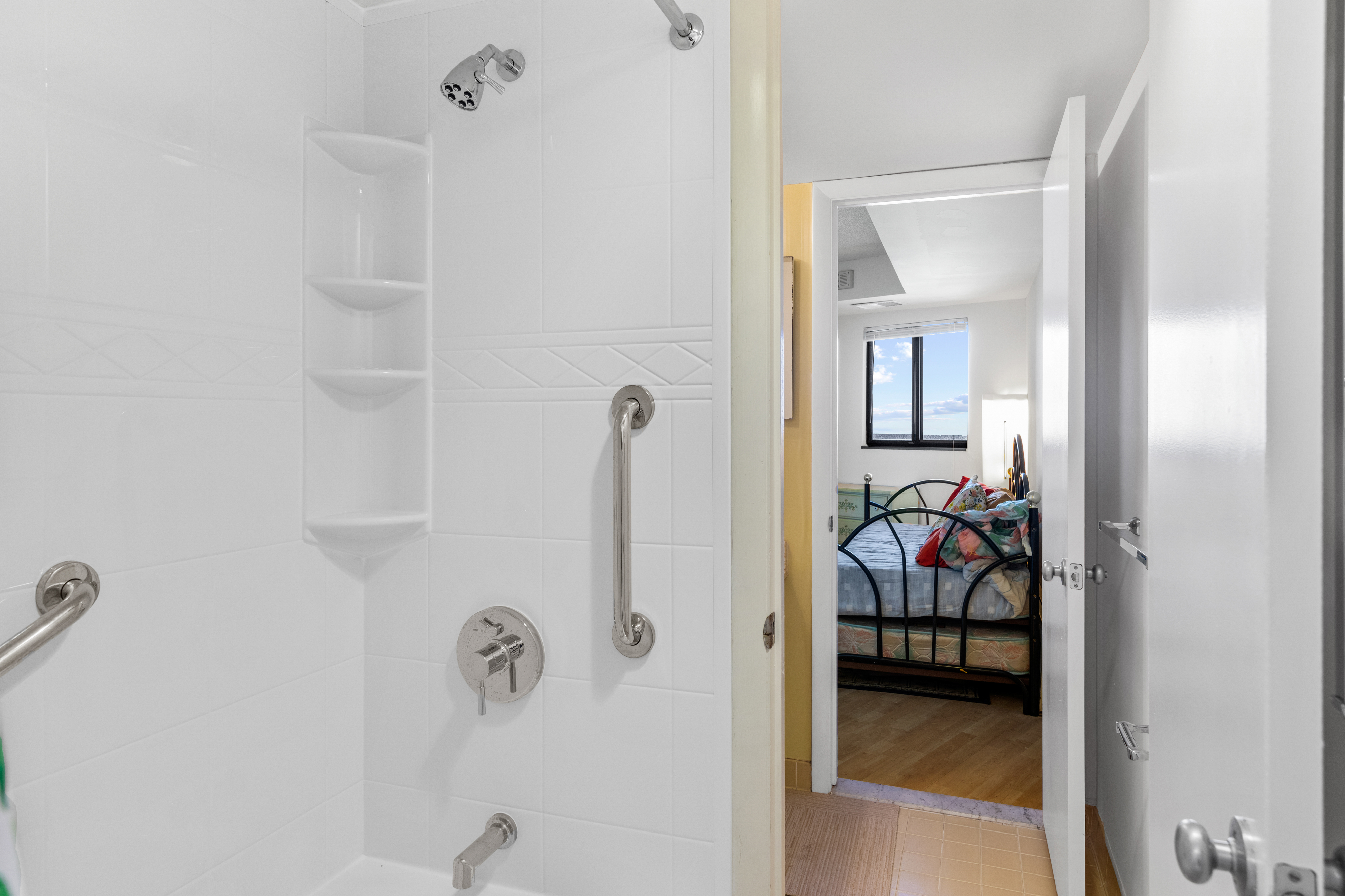 The Shared bath is accessible from the Living Area or Bedroom 2