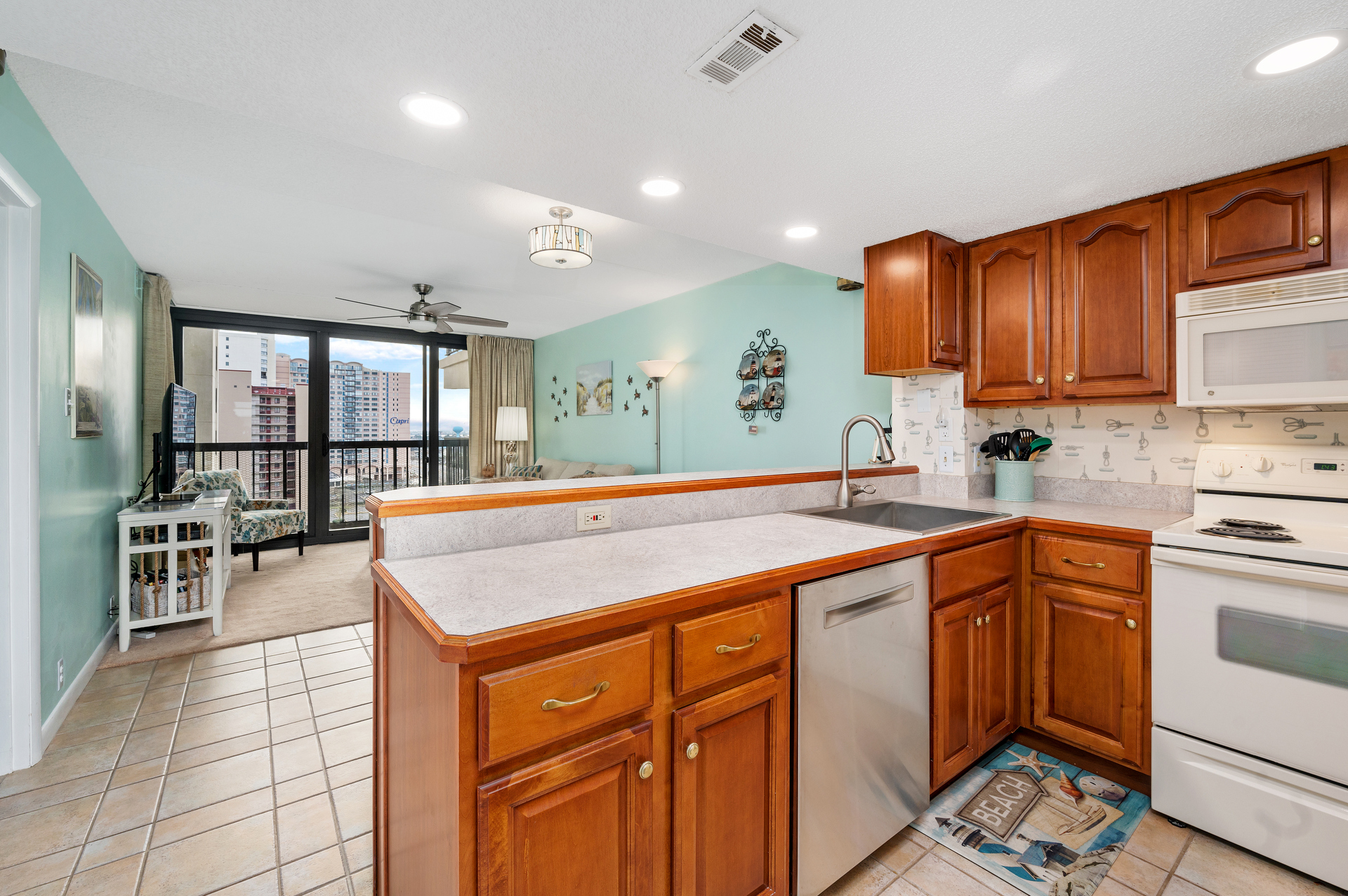 The Kitchen is well-stocked with all the comforts of home.