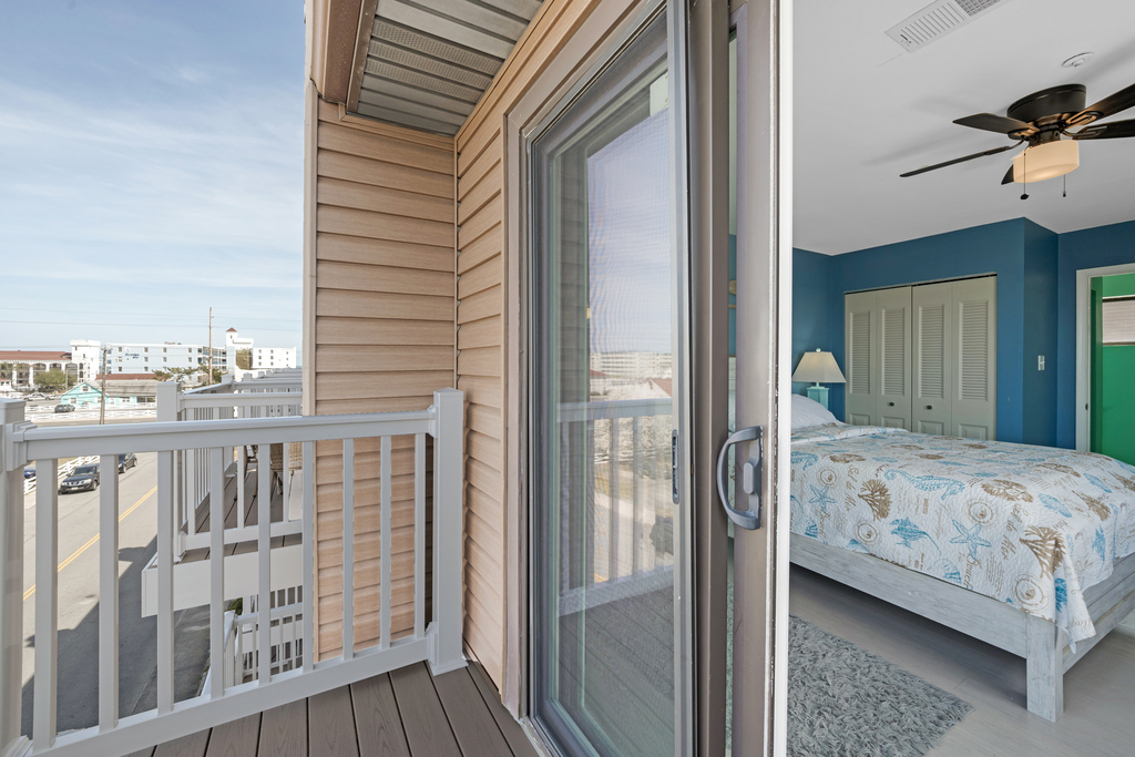 The 3rd floor Primary Bedroom balcony offers sweeping views