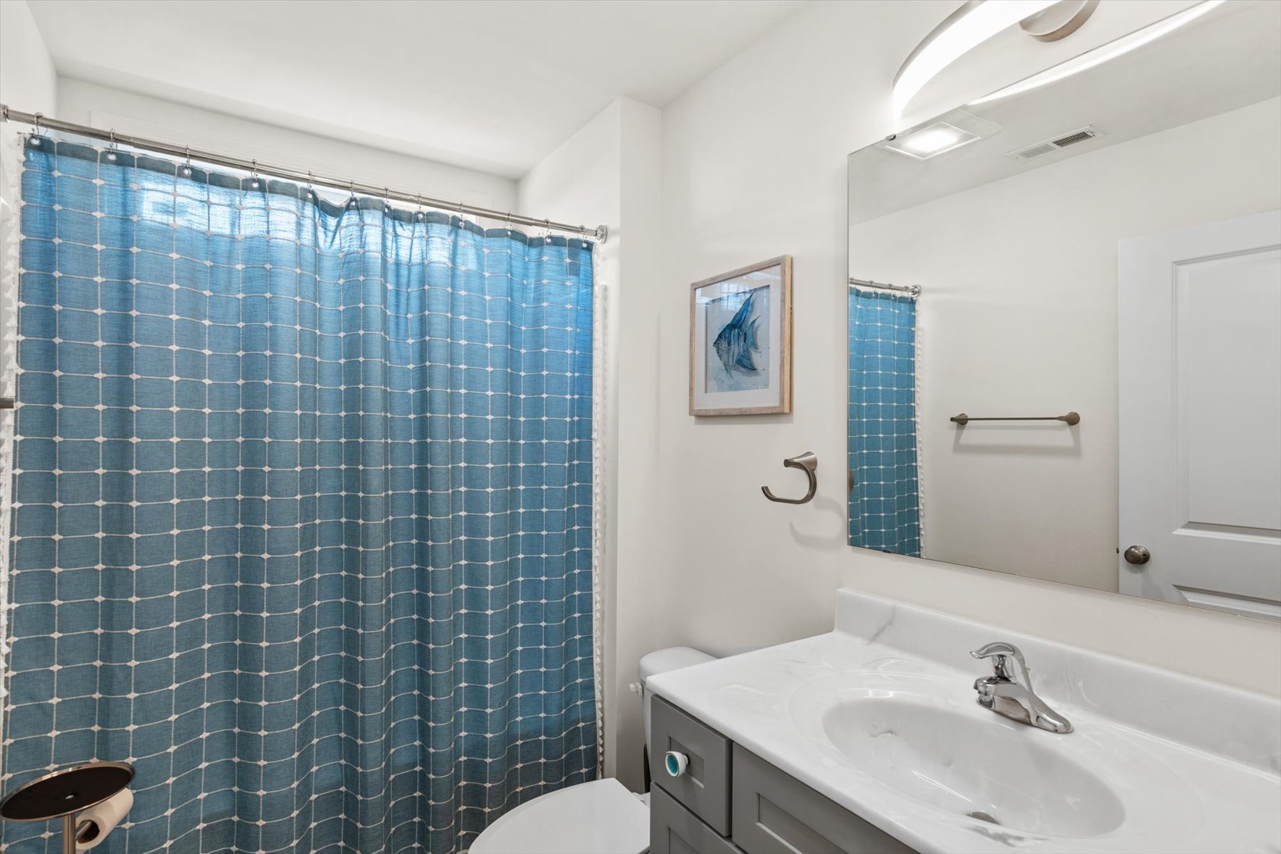 Full Bath 1 is also on the top floor and has a Tub/Shower Combo.