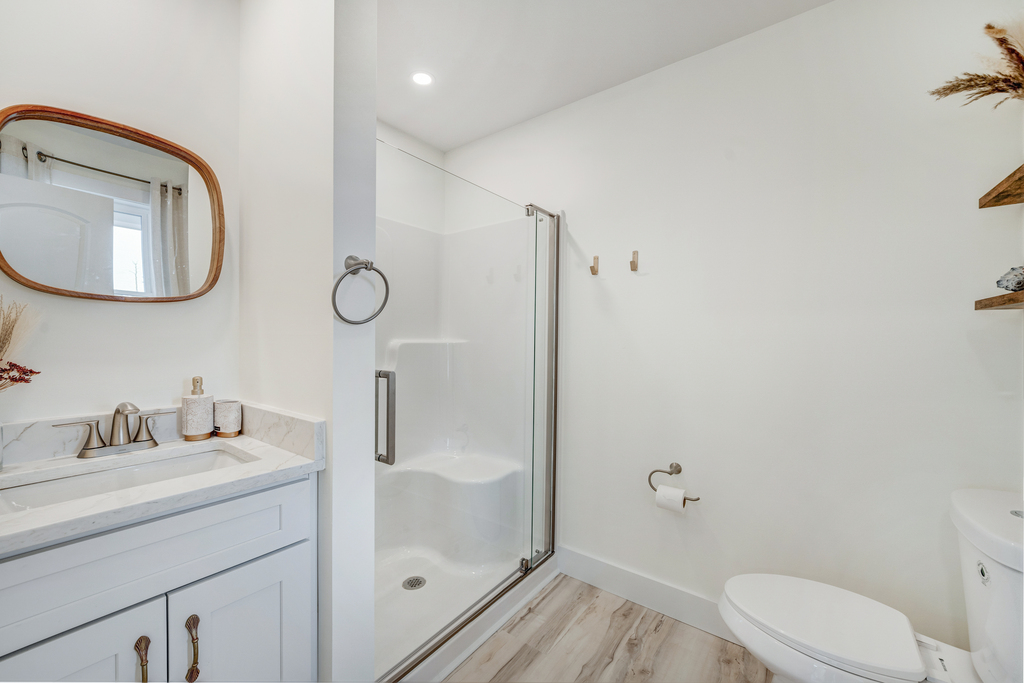 Attached Primary Full Bath with Walk-in Shower.