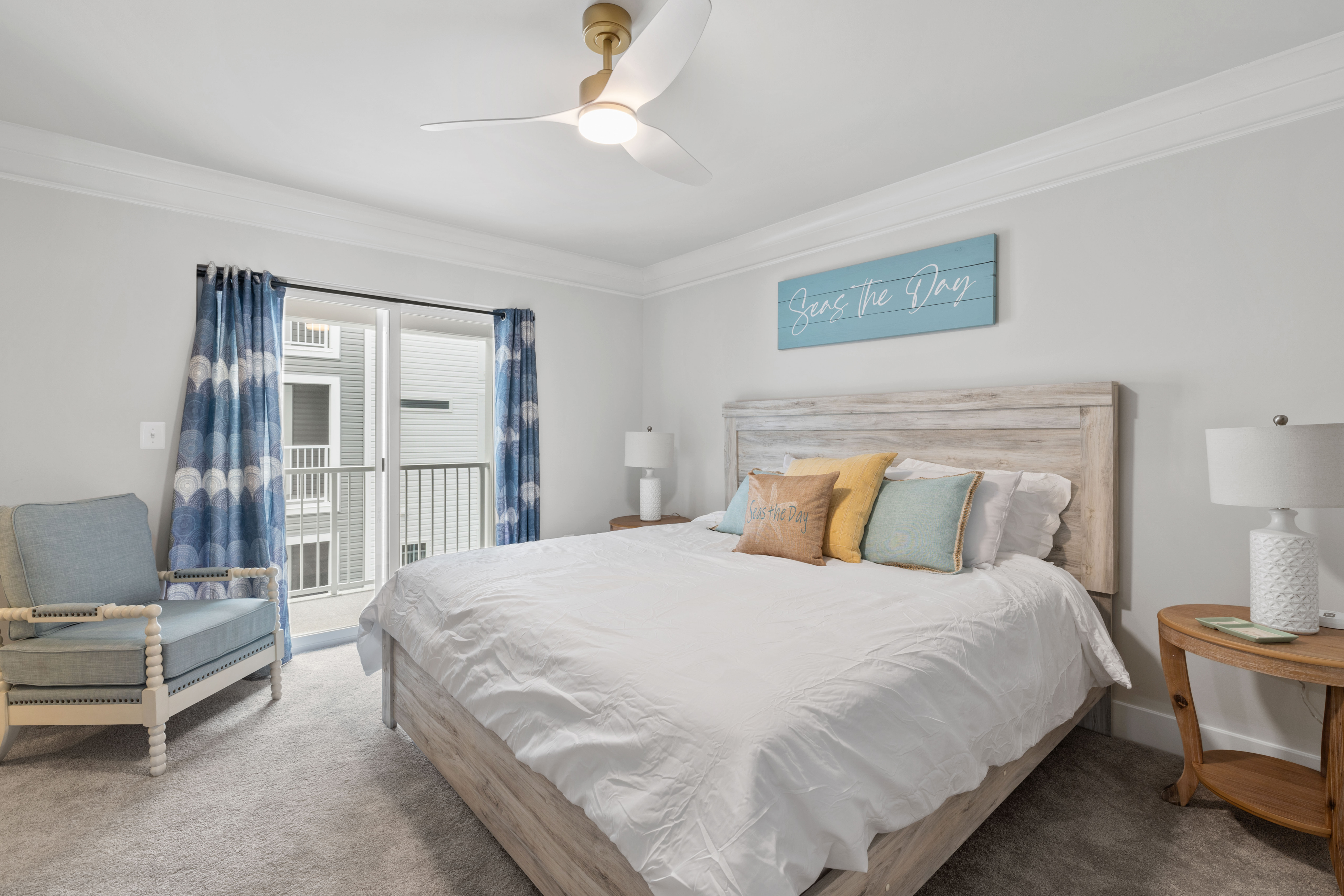 The Primary Bedroom with a private balcony located on the 3rd floor.