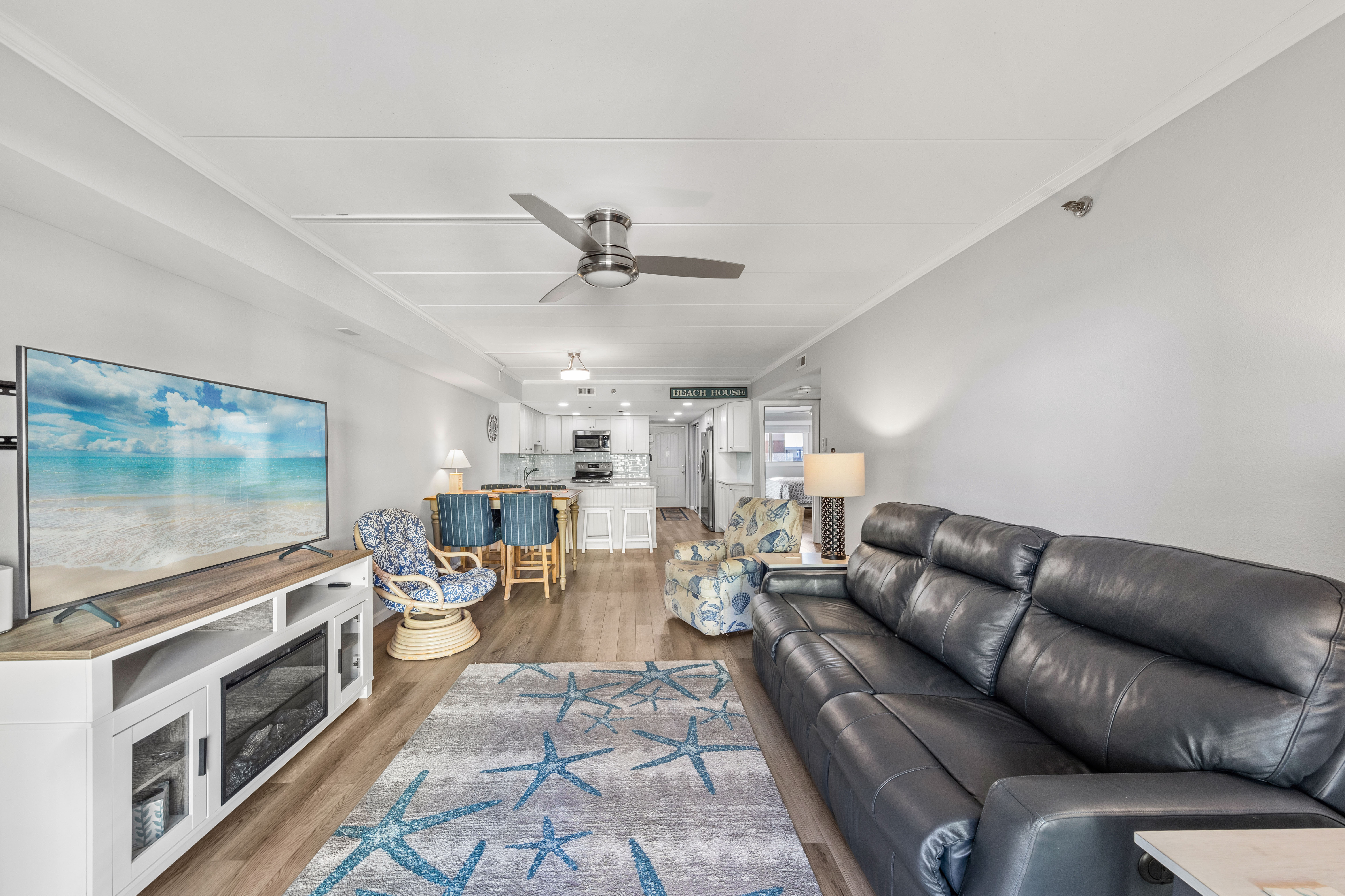 Plenty of seating for the whole family to kick back and watch a movie on the flat screen after a long day on the beach.