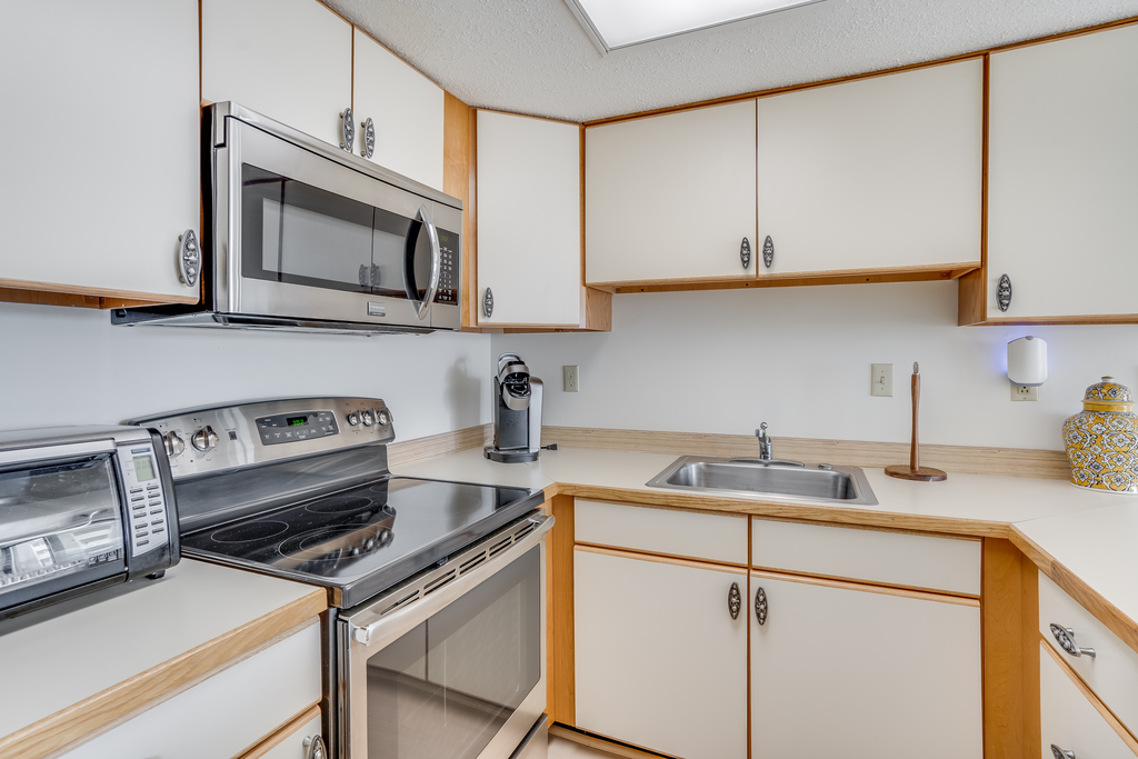 The kitchen is equipped with all the major appliances.