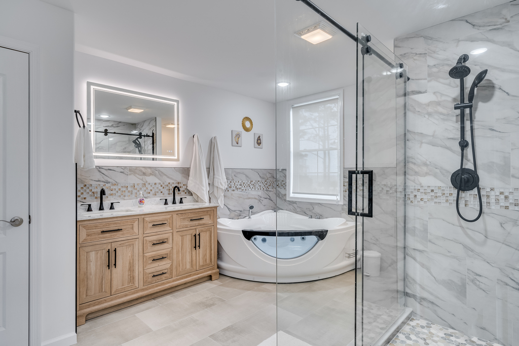 Spa-like Master Bath with Jacuzzi Tub and Custom Walk-in Shower.