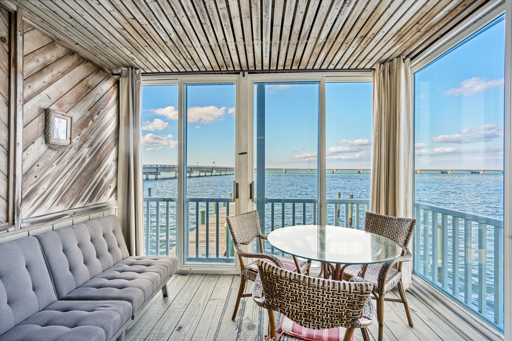 Take in a Chincoteague Sunset overlooking the Channel & Chincoteague Channel.