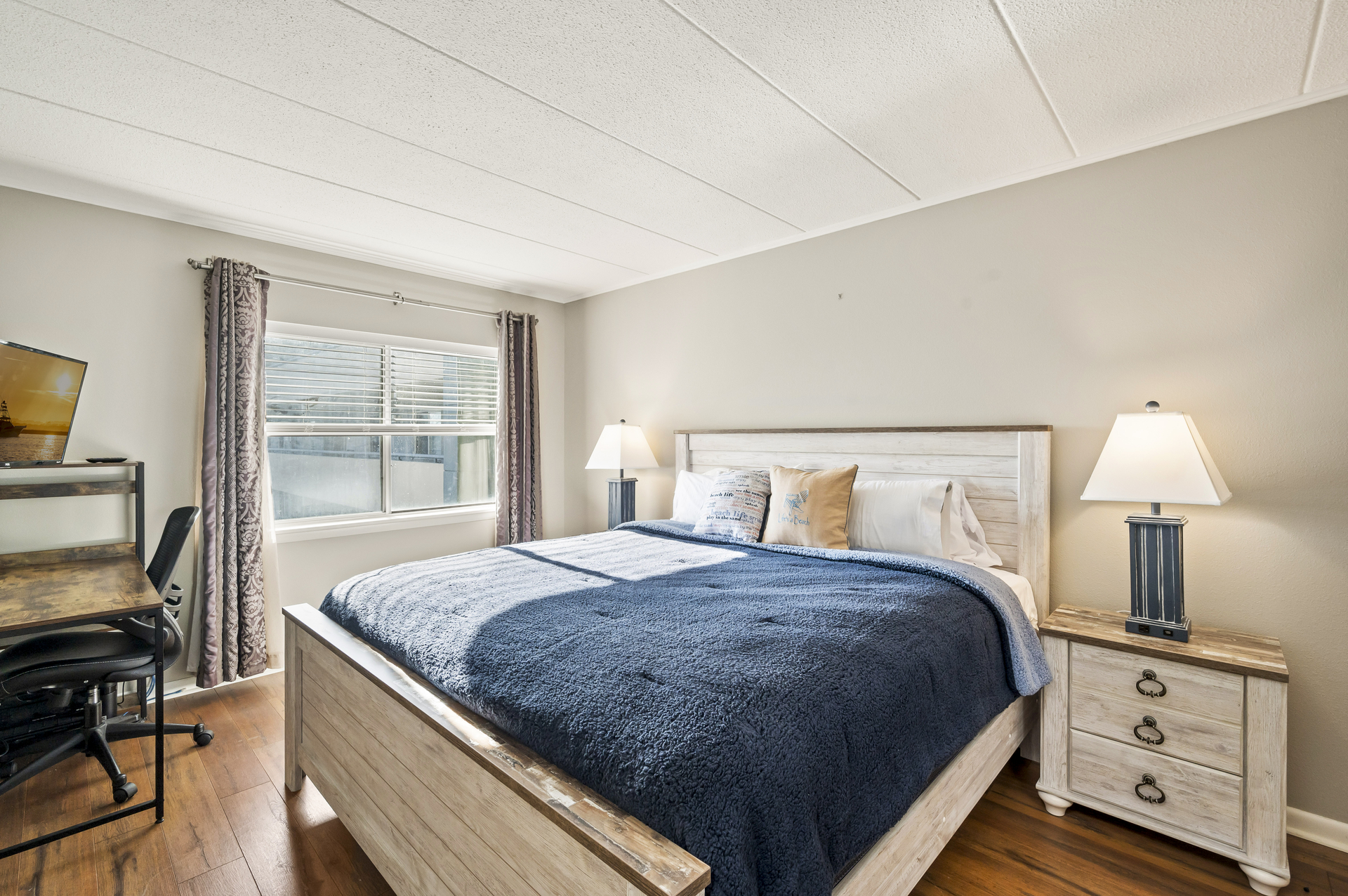 The Primary Bedroom, adorned in Cool & Calming Blues, is a Peaceful Retreat.