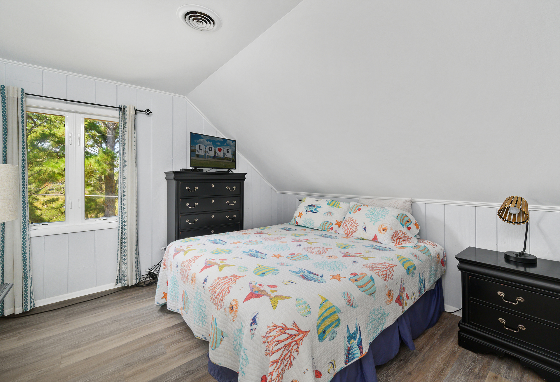Upstairs, the Master Bedroom has a luxurious King Bed and lots of privacy.