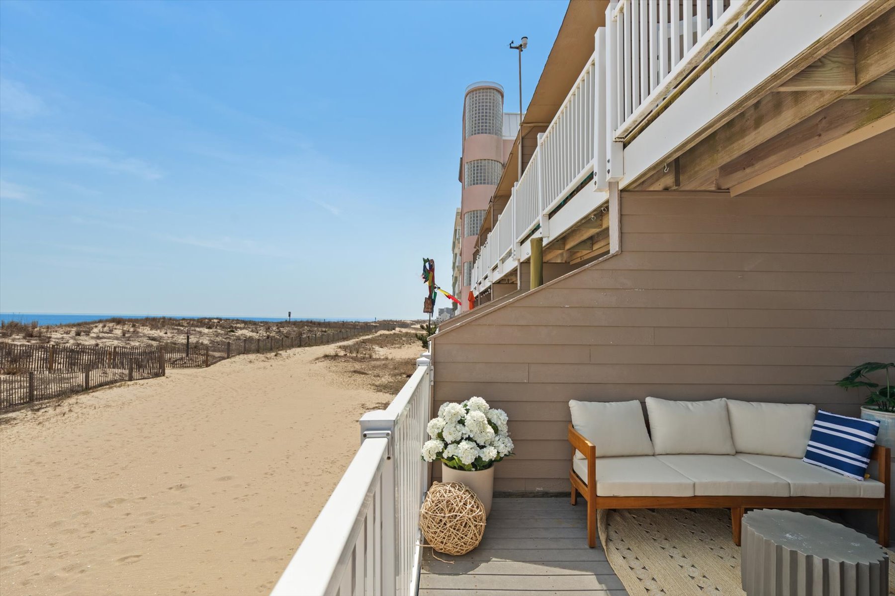 Just steps away from having your toes in the sand!