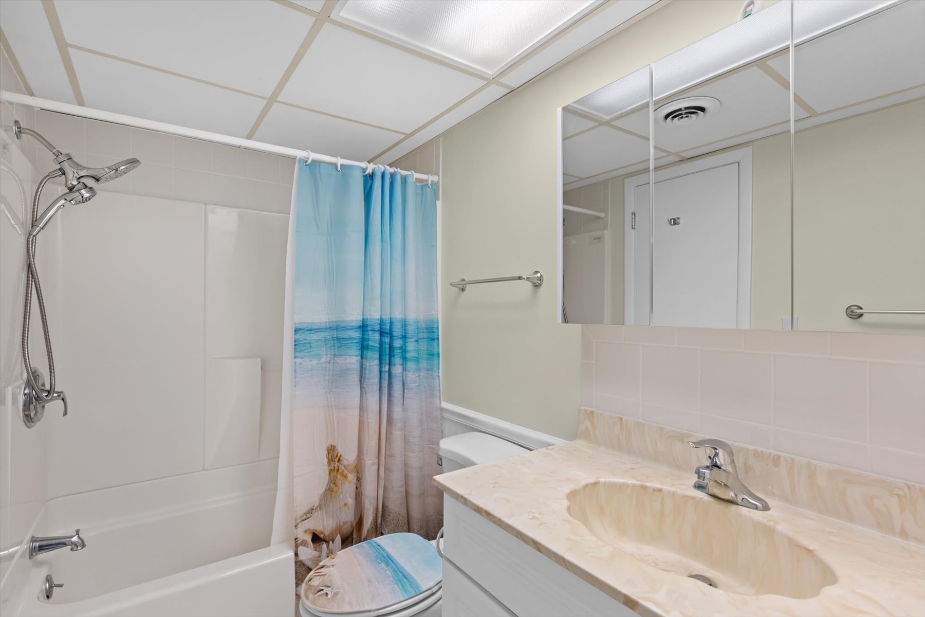 The full bath can be accessed from the hall or the Bedroom