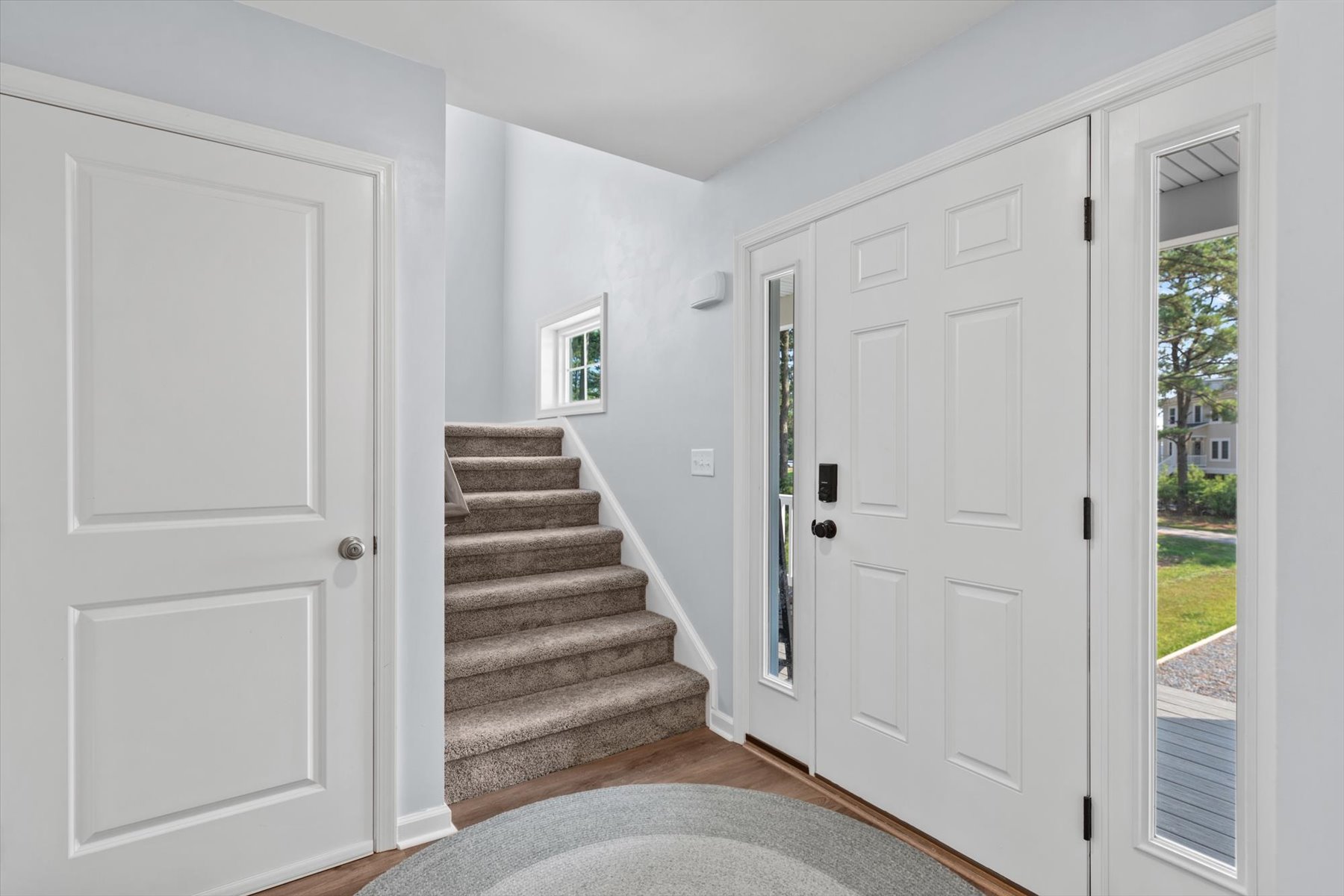 The Entryway and Foyer are located on the lower level.