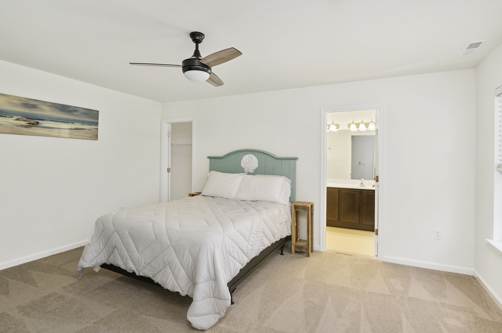 Wandering upstairs, the Master Bedroom has a comfy Queen Bed.