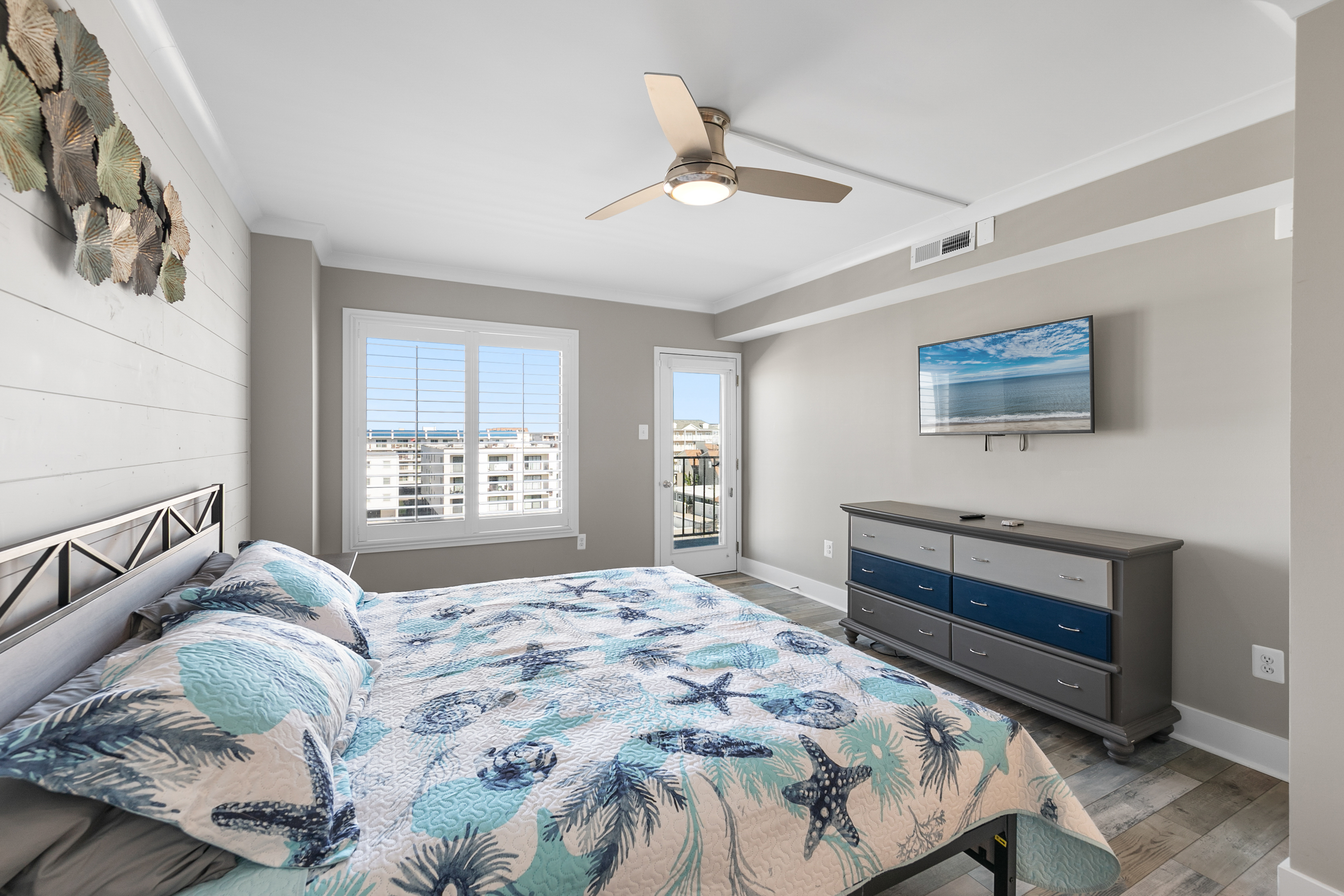 The serene Primary Bedroom has a cozy King Bed, a Flat Screen TV, and Attached Full Bath.