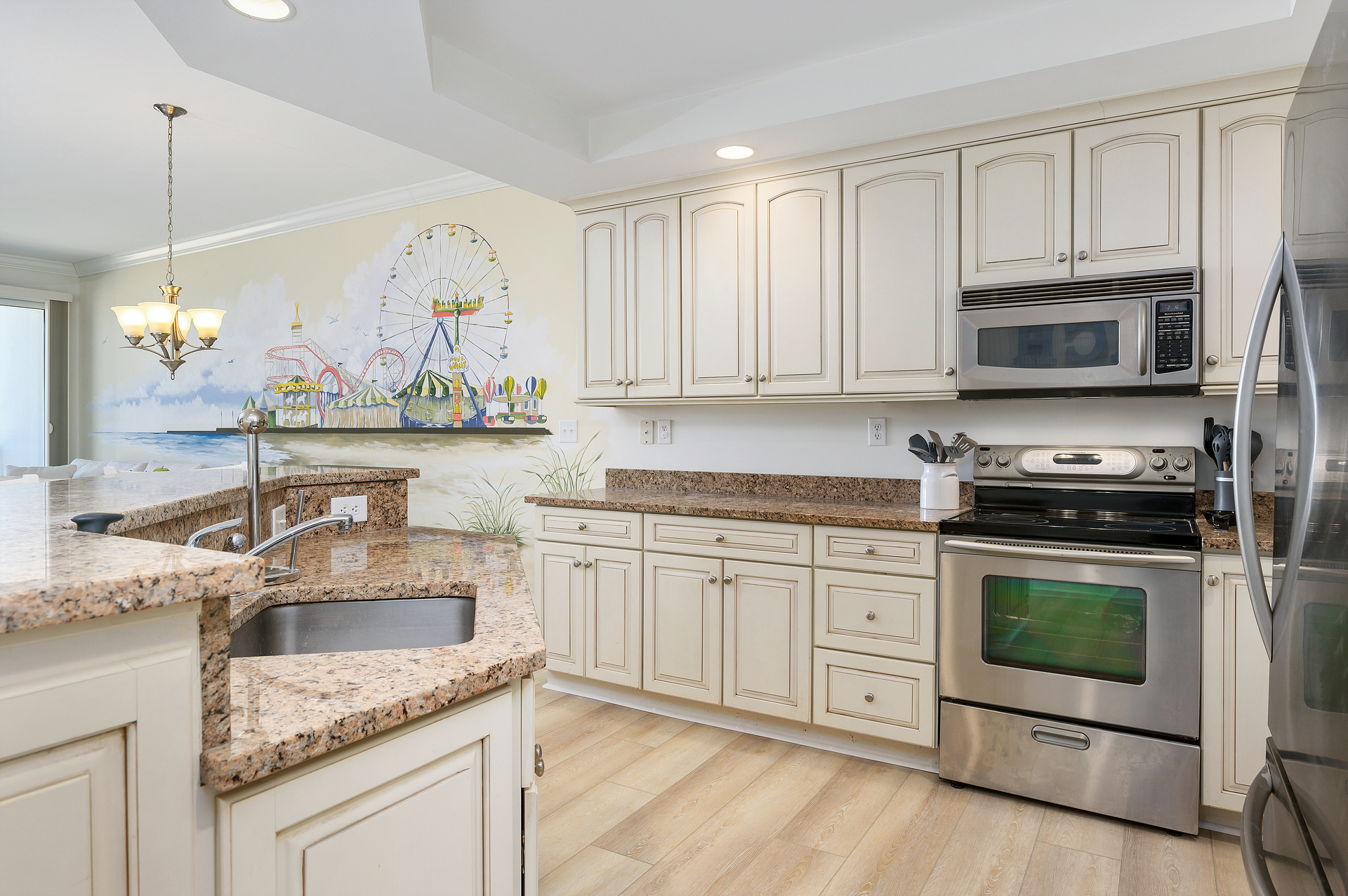 This Kitchen is equipped with Stainless Steel appliances and all the gadgets you could need