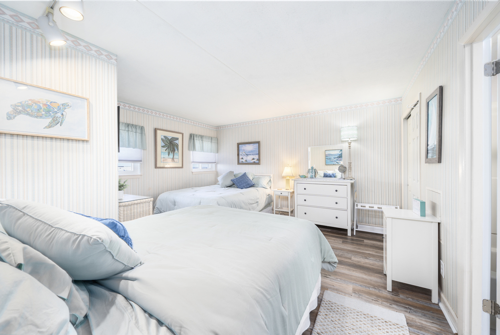 The Bedroom has 2 Plush Queen Beds!