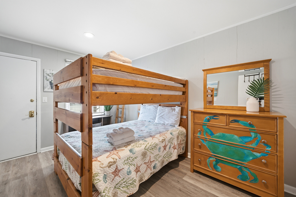 You'll enter Beachy Place through Bedroom 1.