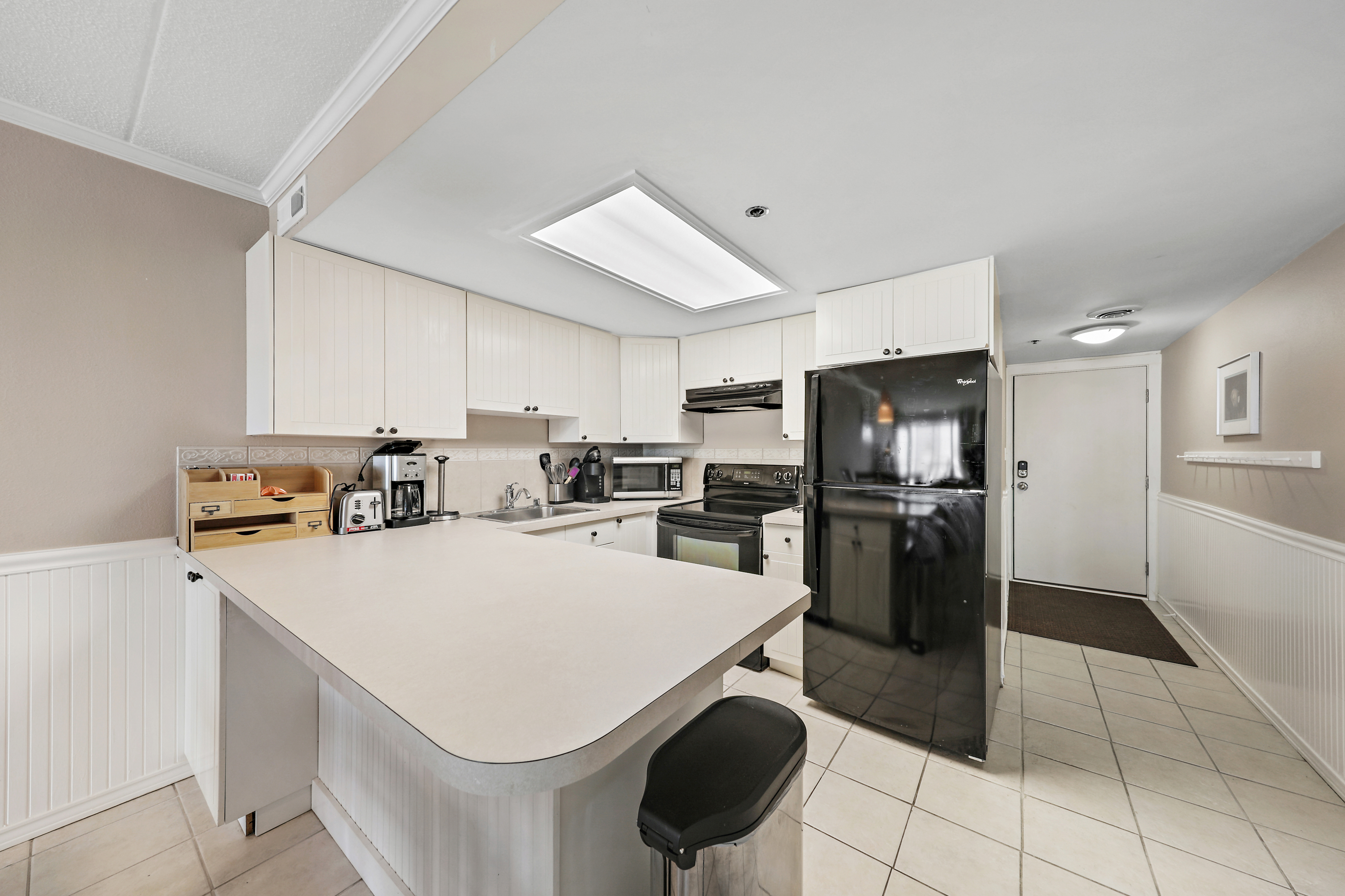 This has it all, updated appliances, large countertops.