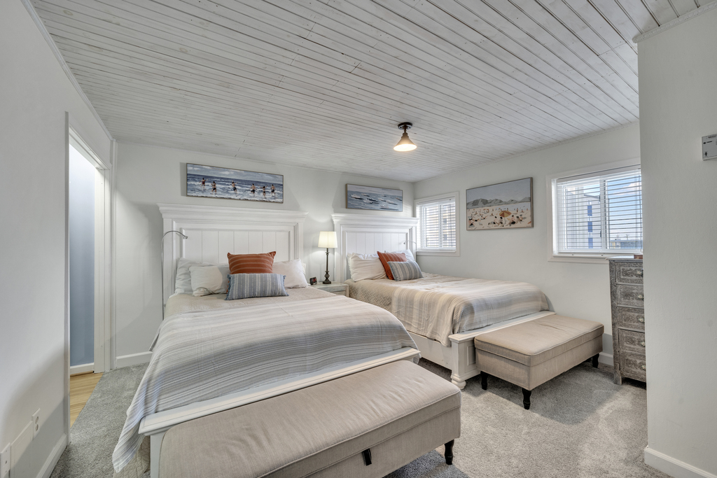 The Bedroom has 2 Plush Queen Beds!