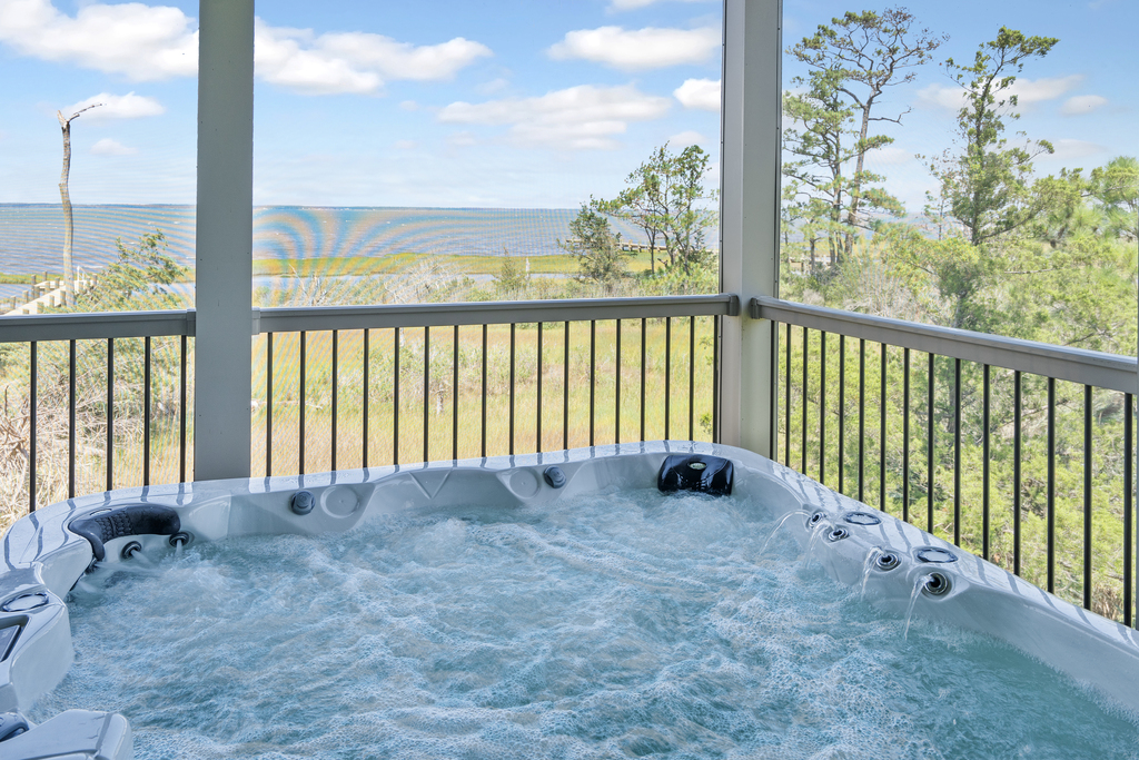 Imagine enjoying a Chincoteague Sunset with this view from the hot tub!