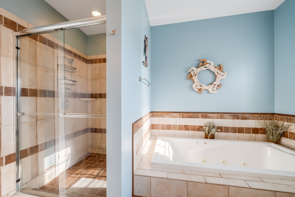 Primary Bath has Walk-in Shower and Soaking Tub.