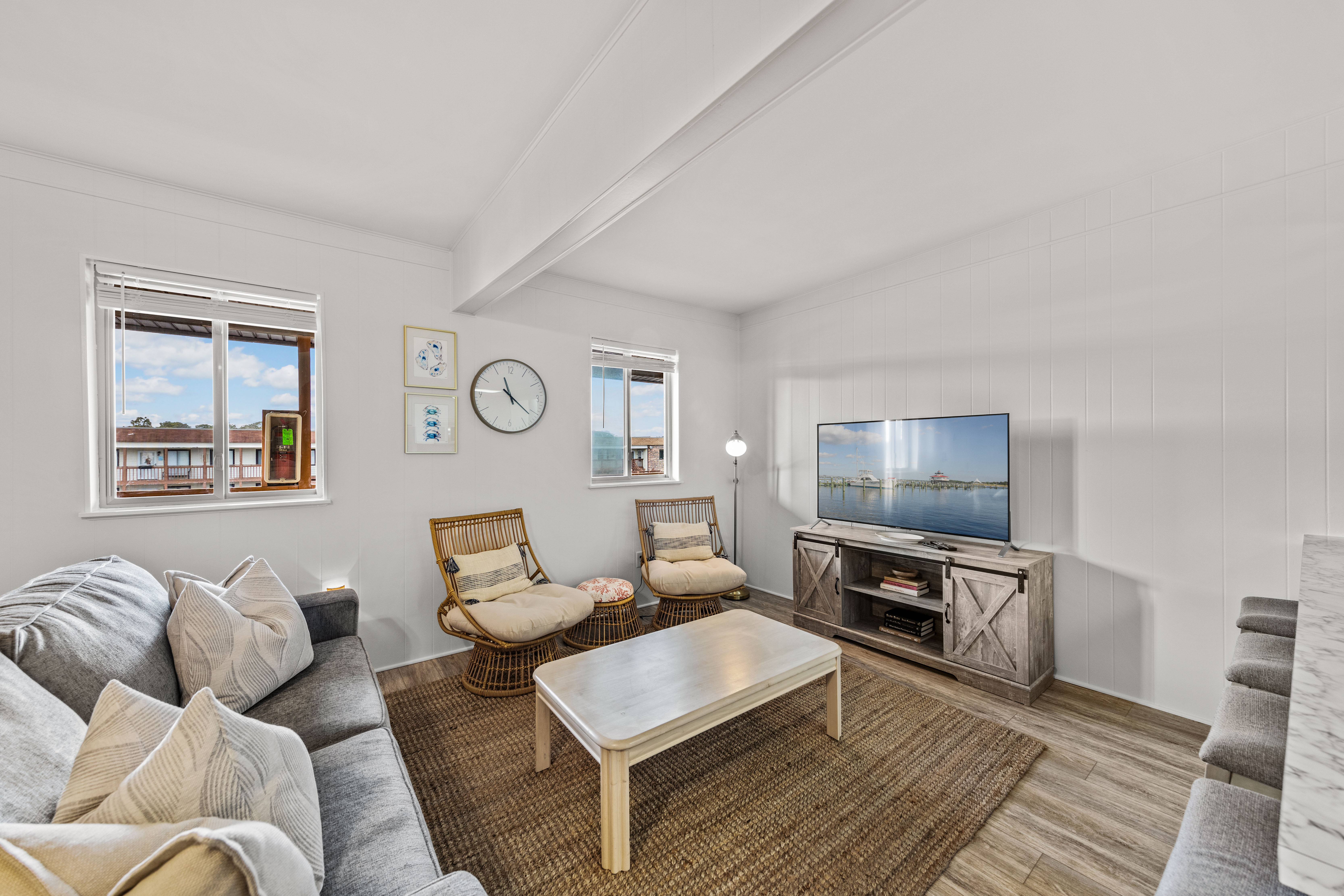 This cozy living room is the perfect spot to gather the family and watch a movie on the Flat Screen TV.