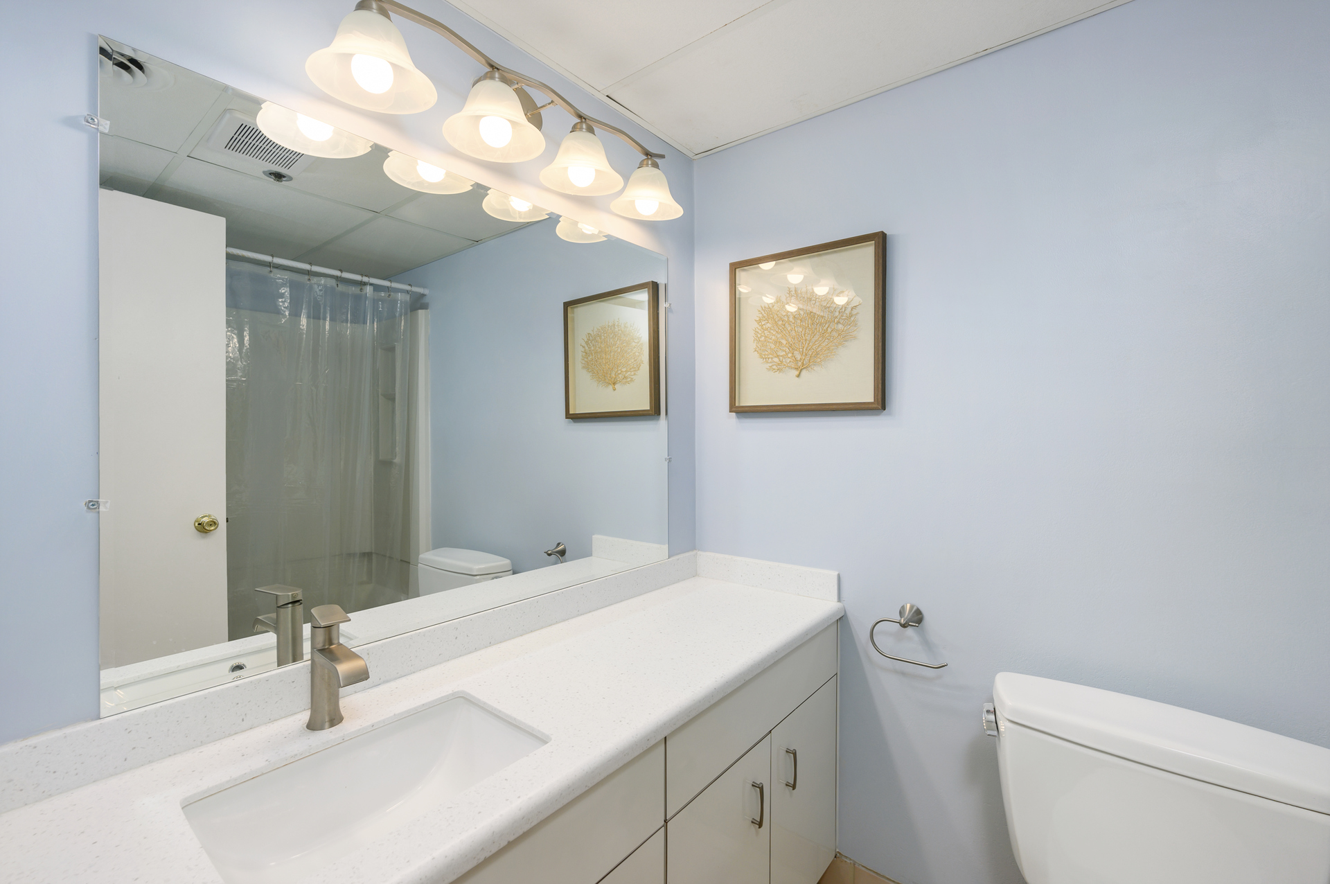 Bathroom 2 is off the kitchen and has Shower/Tub combo