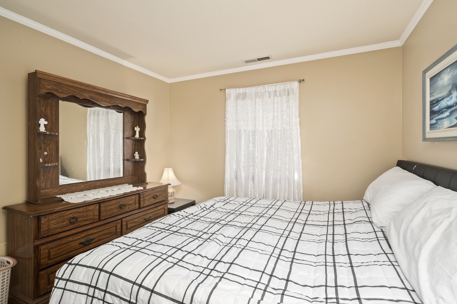 Bedroom 2 is reminiscent of your day at the Sandy Beach.