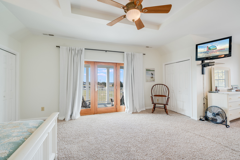 Bedroom 1 is the Primary Bedroom Suite with a King Bed - and it's total luxury.