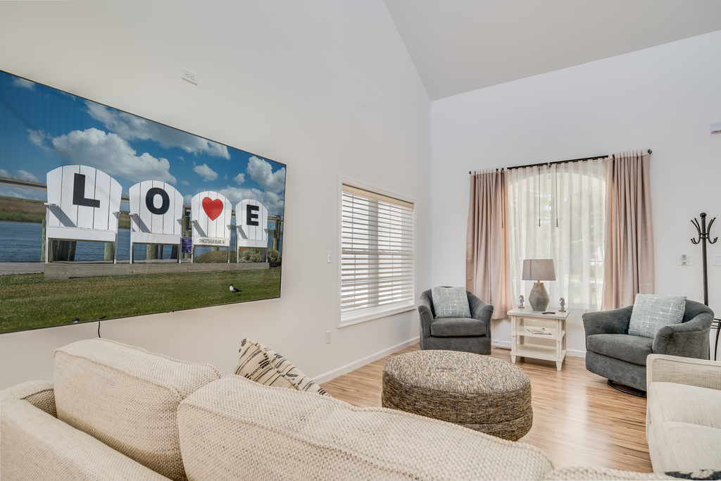 This spectacular 5 Bedroom Home sits Waterfront in Captain's Cove Golf and Yacht Club.