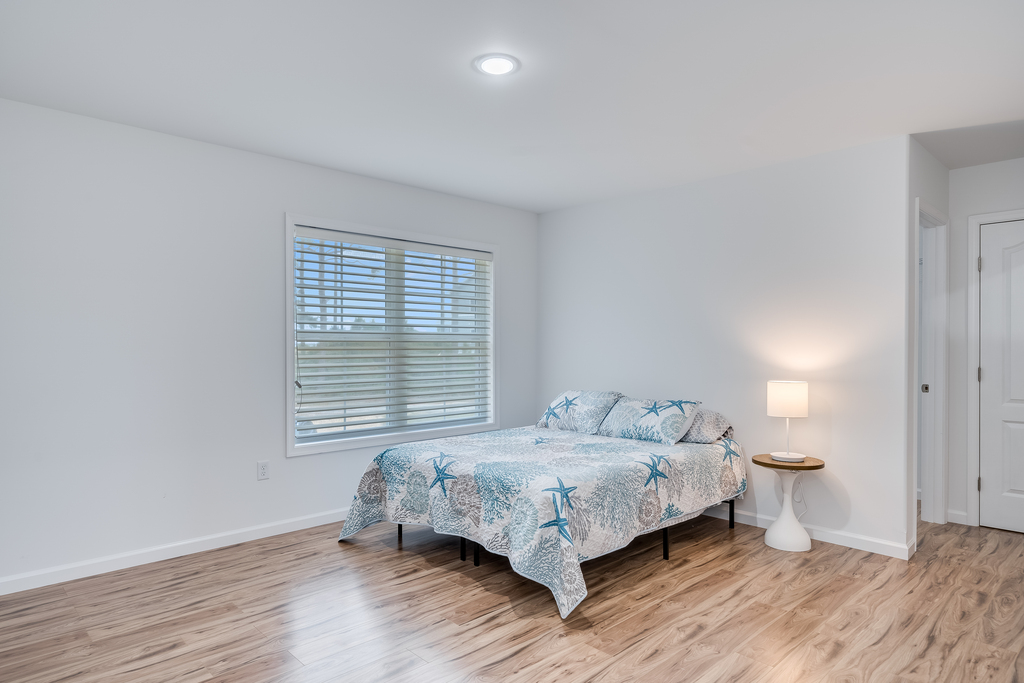Bedroom 2 also has a Queen Bed and an Attached Full Bath.