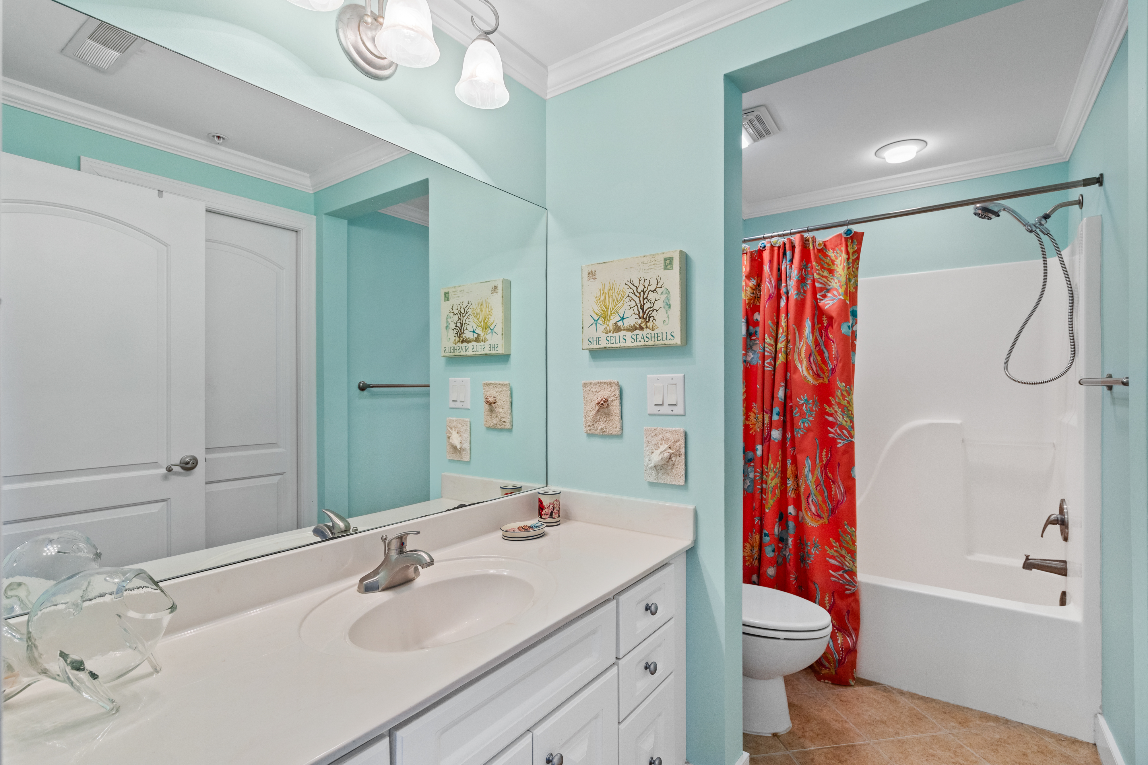 Full Shared Bath with a Shower/Tub Combo.
