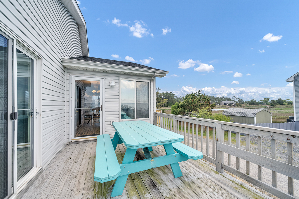 Dine outdoors with lovely Bay and Sunset Views.