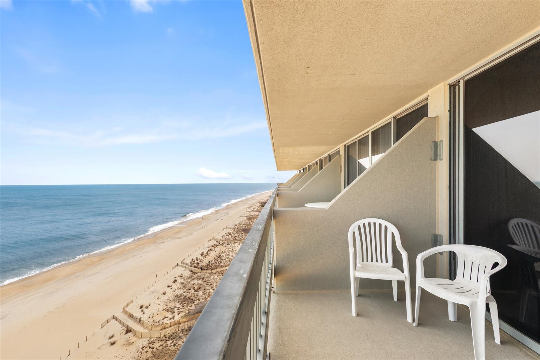 Relax in the shade and watch the waves hit the beach.