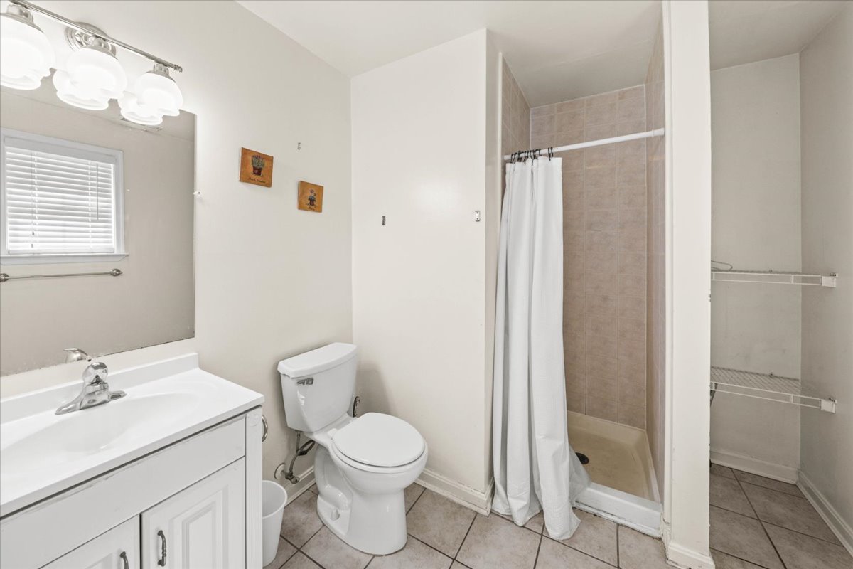 The Shared Bath offers a Walk-In Shower.