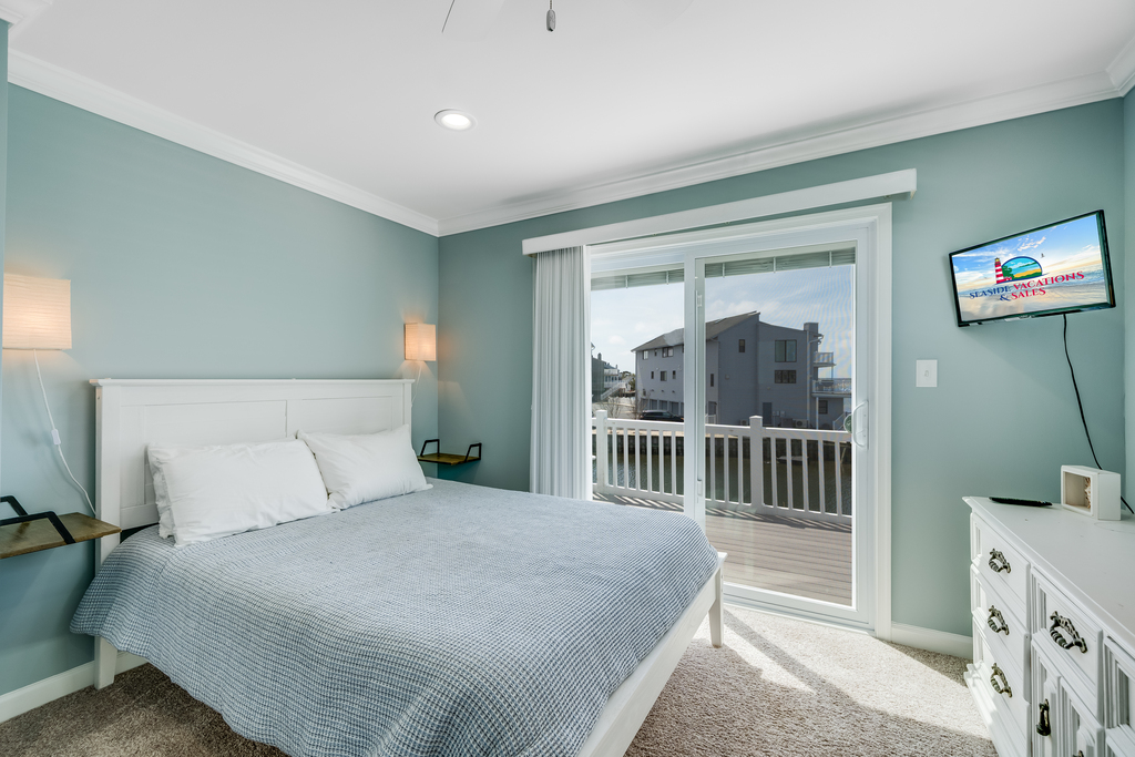 Slip out on the balcony and watch the moon dance over the water.