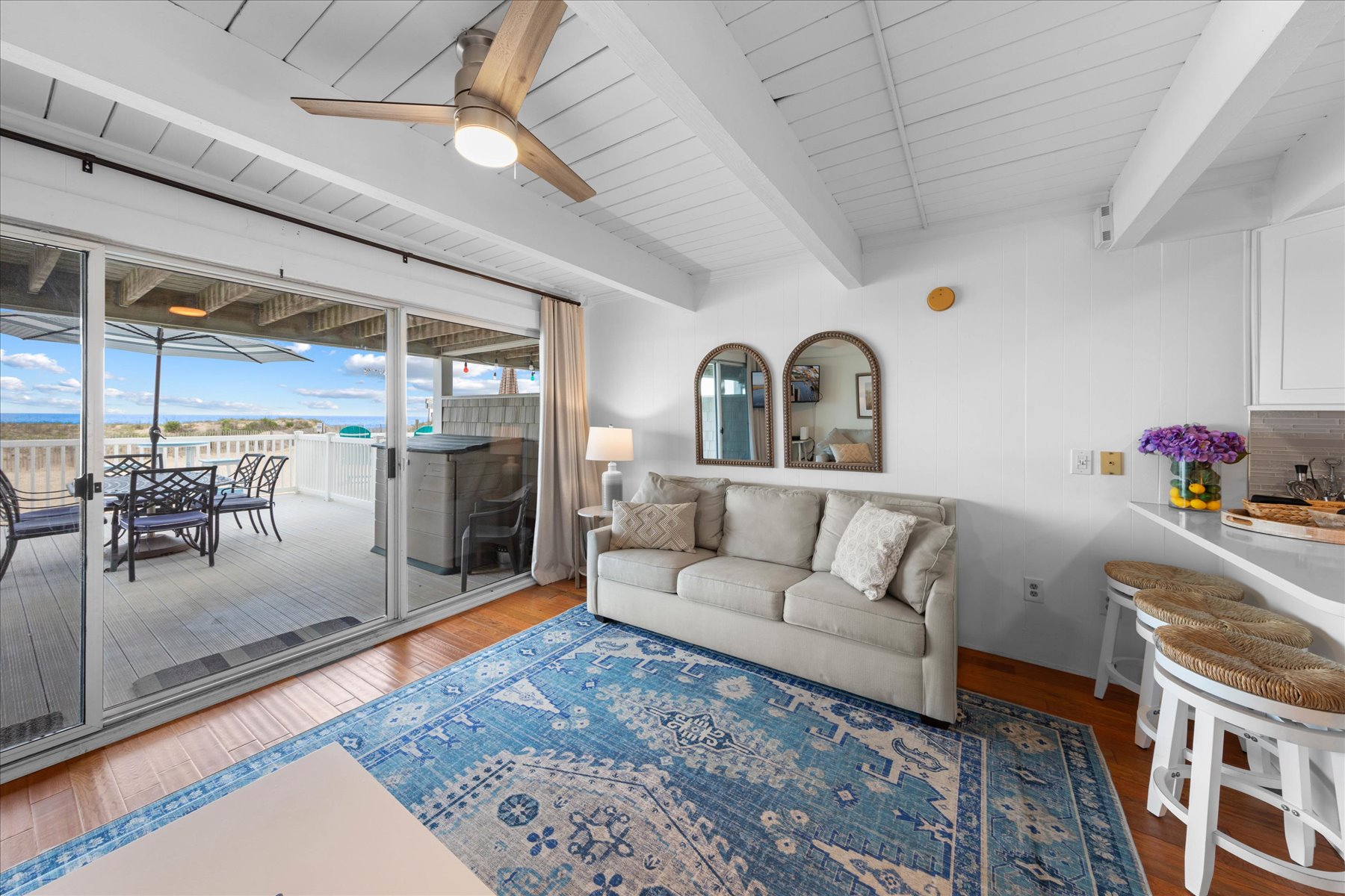 Relax and sink into the warm and cozy furnishings in the living area.