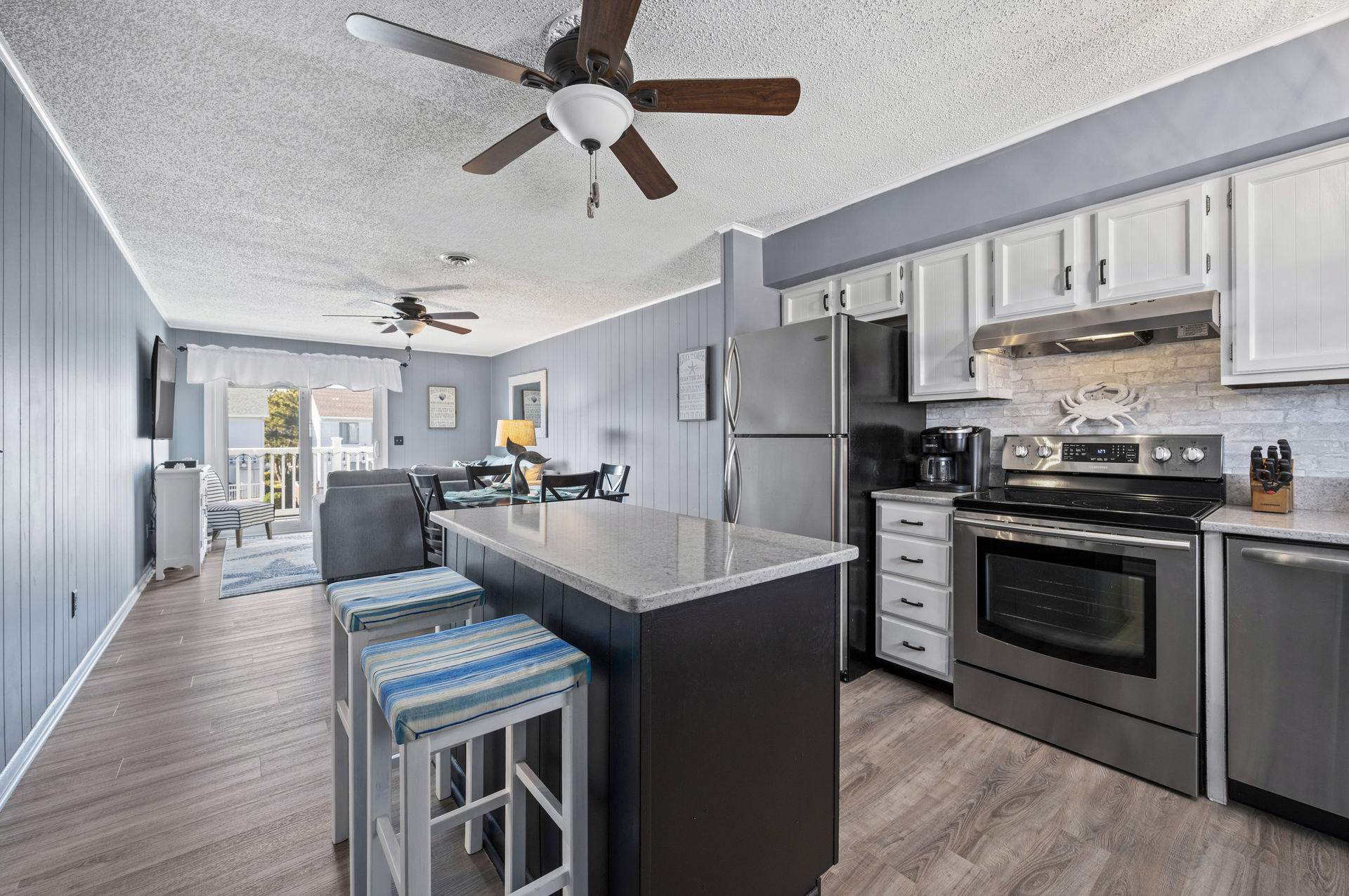Gorgeous Fully-equipped Kitchen with Stainless Appliances.