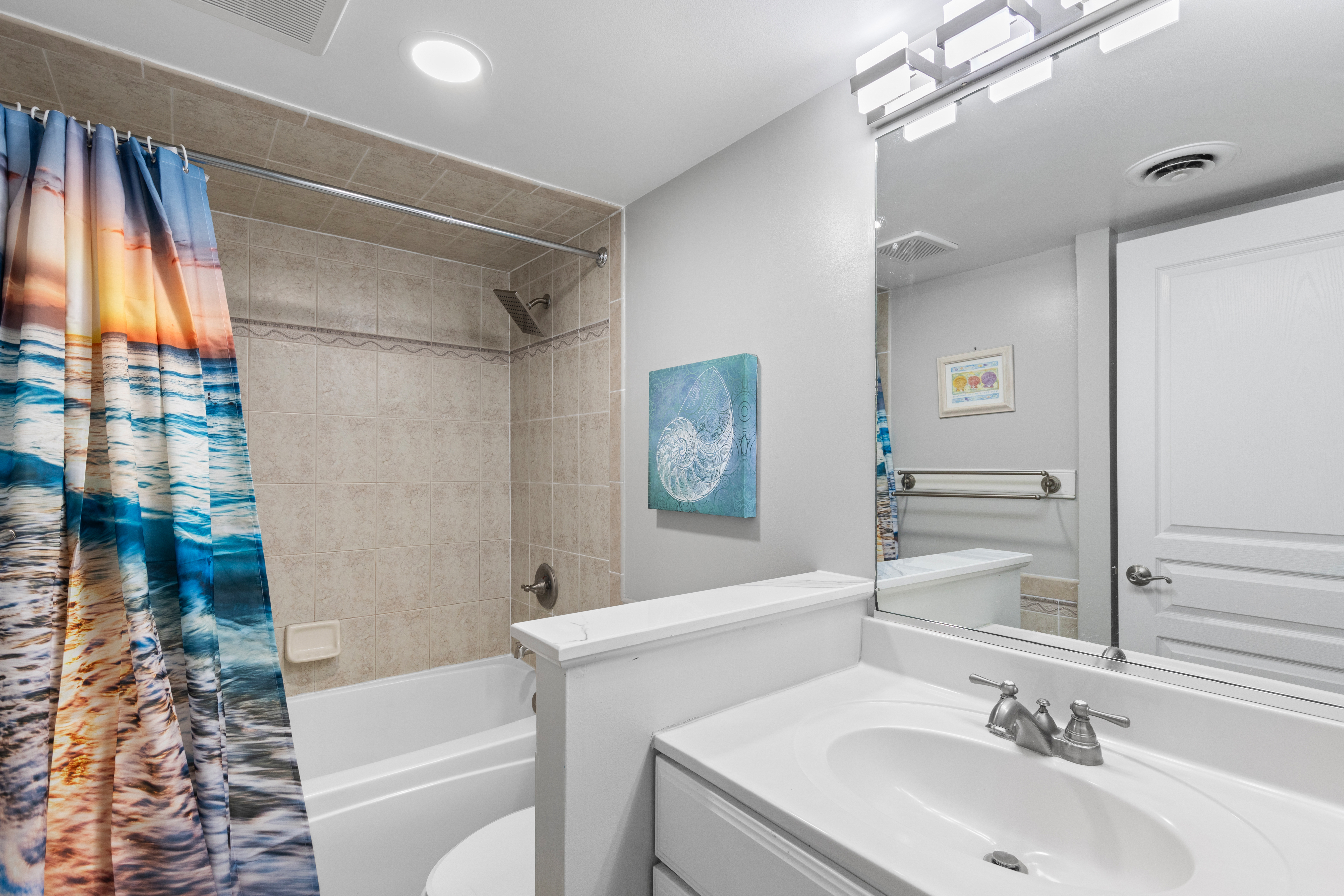 Bedroom 2 has a full-size Bath with a Shower/Tub Combo!