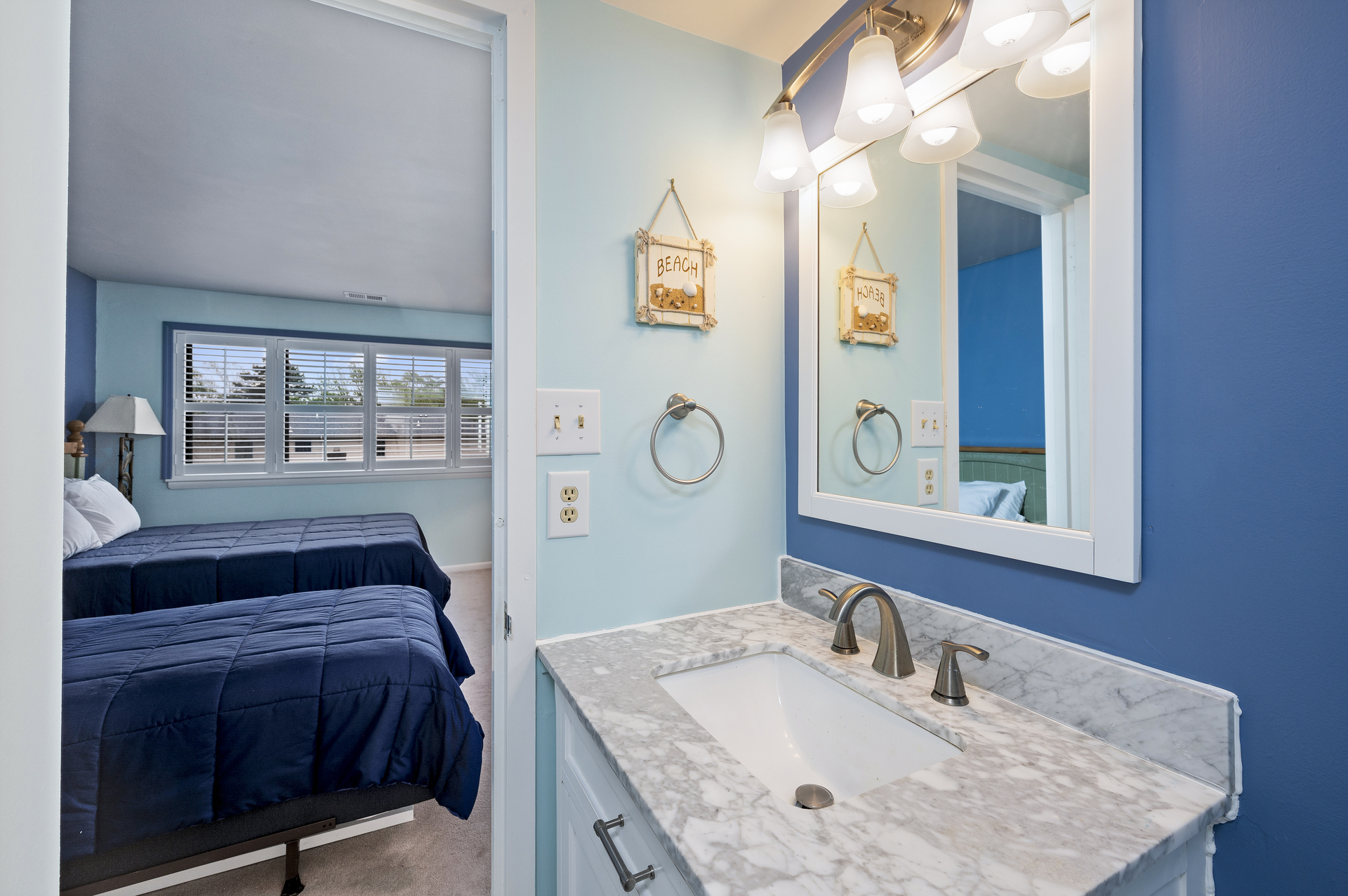 Private Bath in Bedroom 2 with Walk-in Shower.
