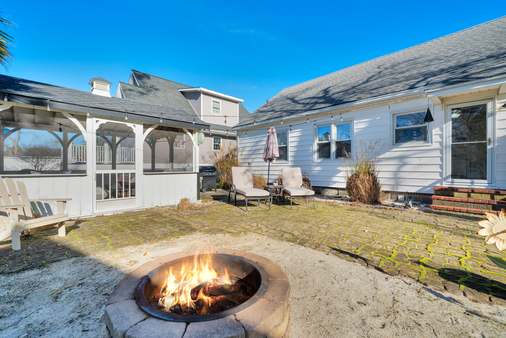 Slip out the Kitchen door to the fabulous backyard oasis.