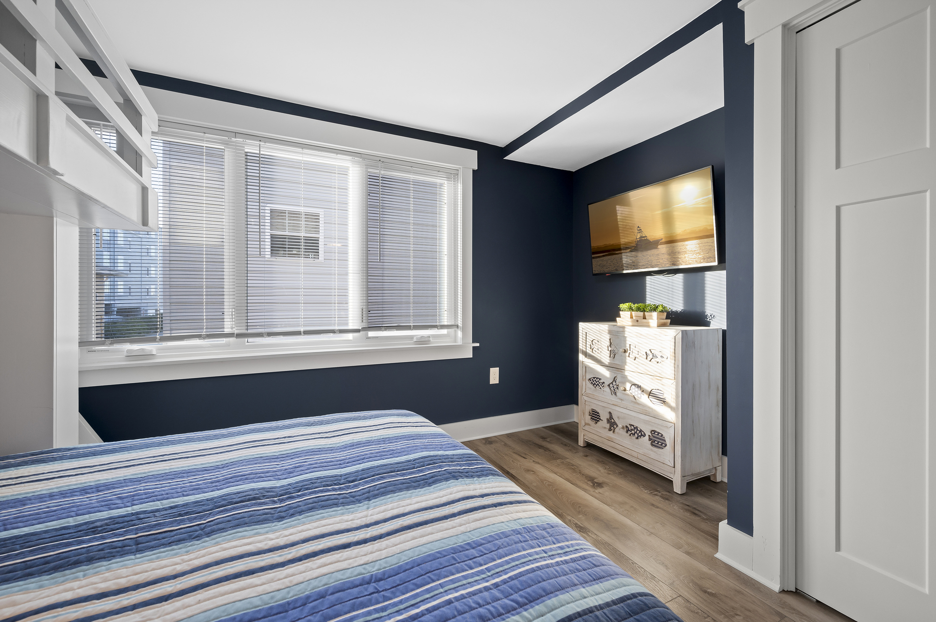 Adorned in Nautical Navy and White.