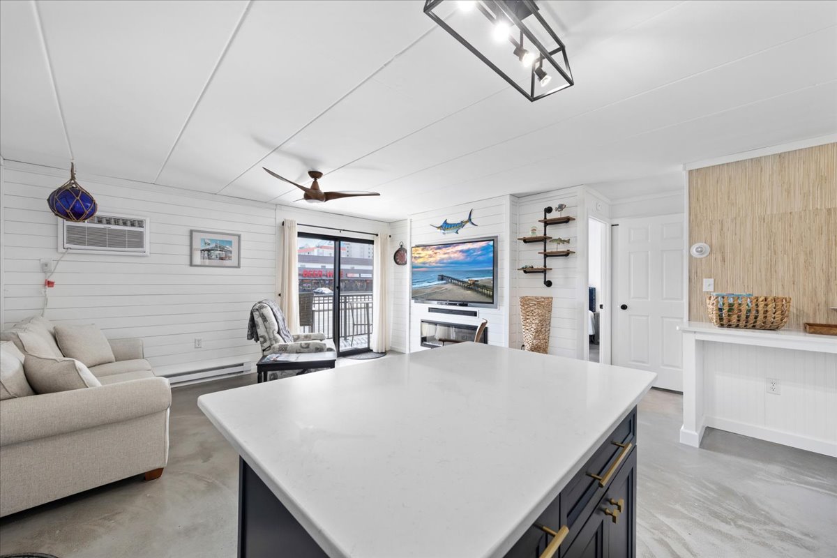 The Open Living & Kitchen Area allows you to never miss out on a bit of Family Fun.