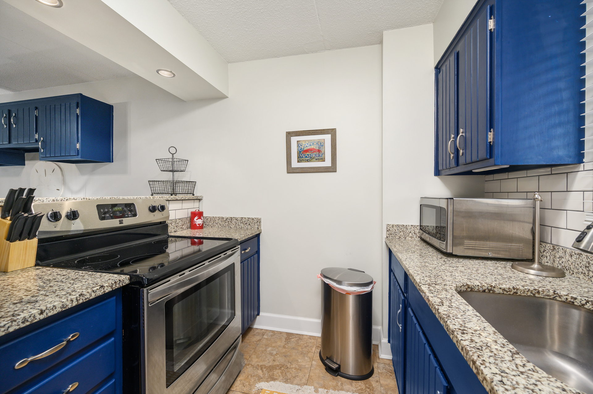Kitchen is updated with stainless steel appliances and gorgeous granite countertops!