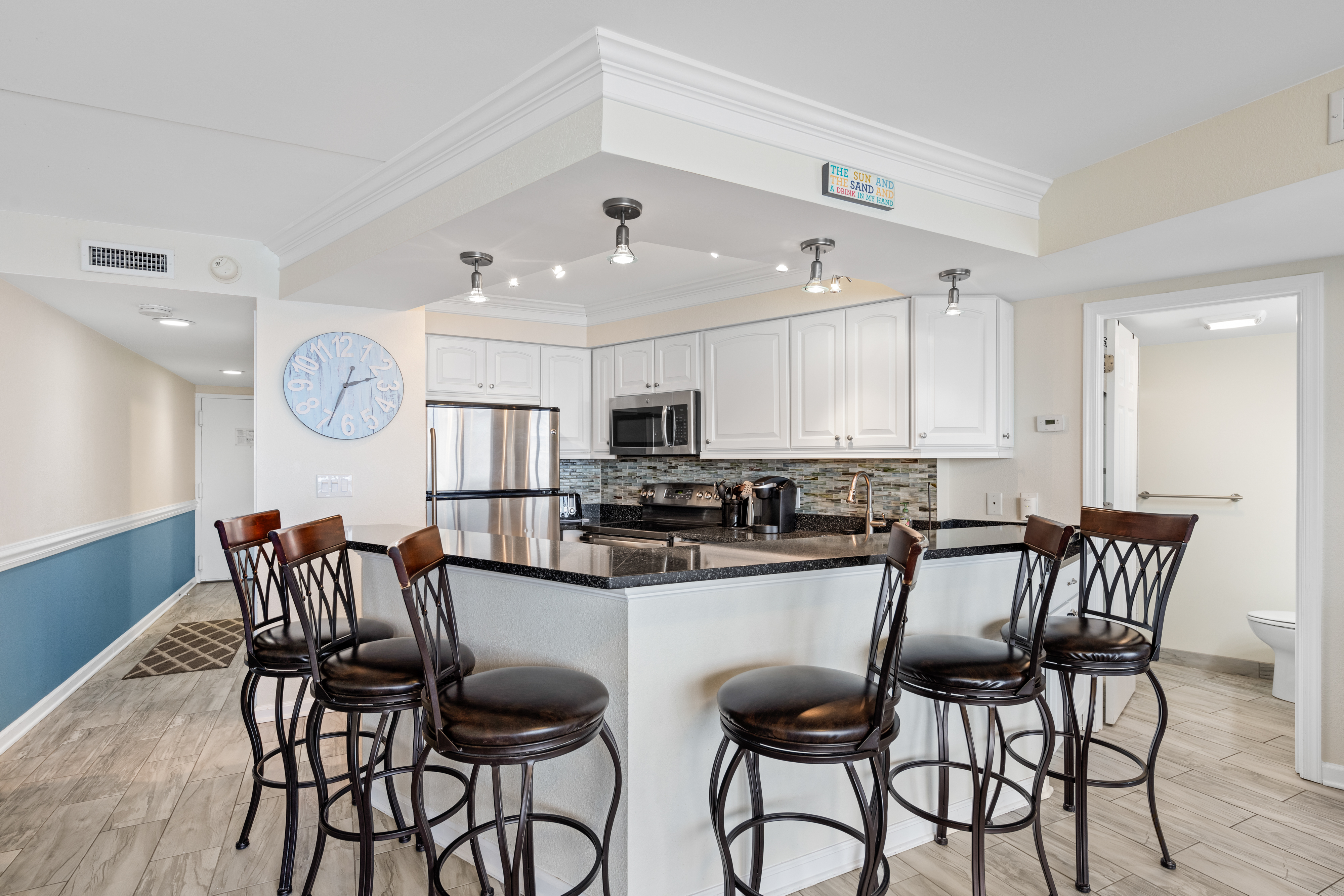 There is plenty of seating at the breakfast bar.