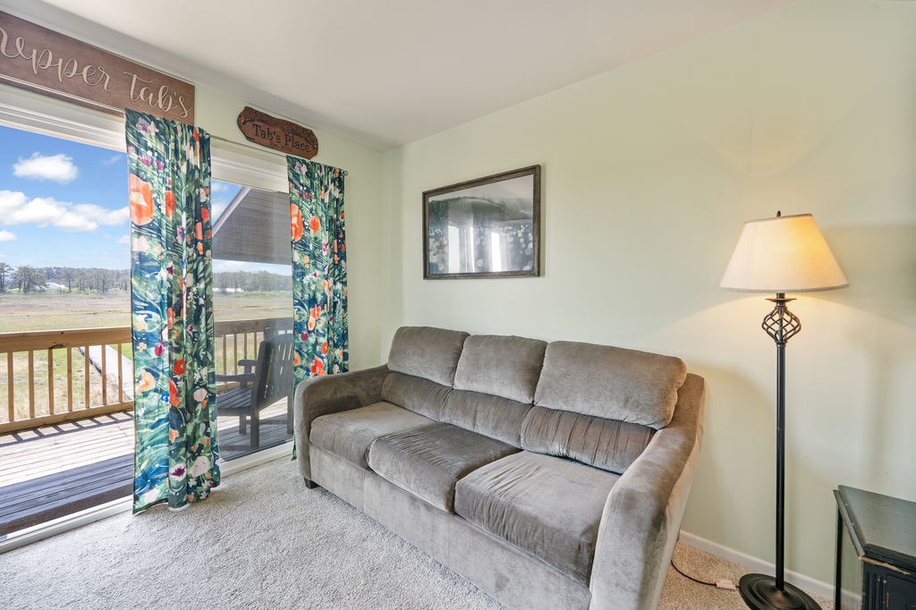 Enjoy gorgeous Views of Eel Creek right from the sofa!