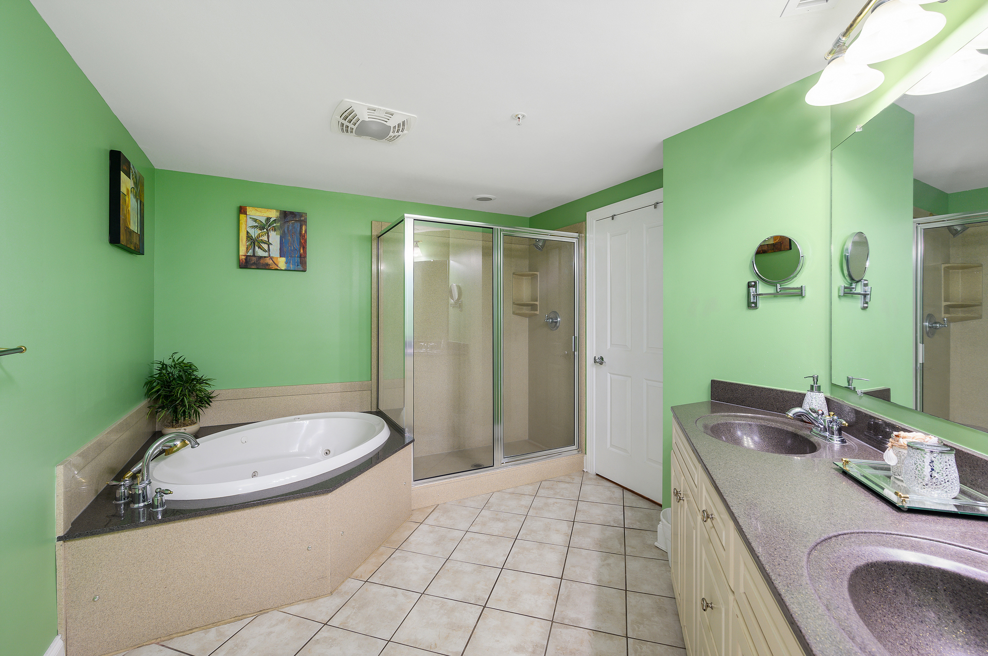 This Primary Bath is sure to feel like a Spa-retreat with the double vanity and soaking tub!