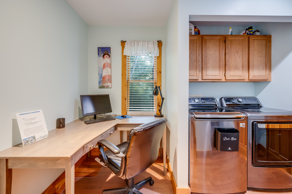 Dedicated Workspace – Need to check in with work while you’re away? This convenient home office offers a desk and comfortable chair for catching up or staying connected.